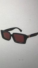 paire de lunettes de soleil Tods neuve , valeur achat 240€ .