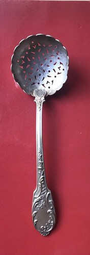 Cuillère saupoudreuse à - ou,
