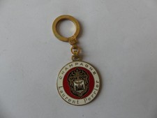 PORTE CLÉ METAL DORE ET EMAIL