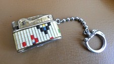 Ancien rare porte clé Briquet