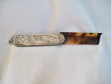peigne à moustache art