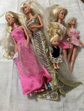 Lot de 10 Barbies en tenue et bon état de 1996