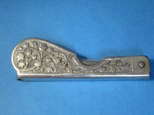 Molette de couture ancienne en acier pliable