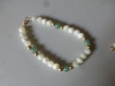 fond de stock bracelet  perle en nacre + perle en pierre verte + perles laiton