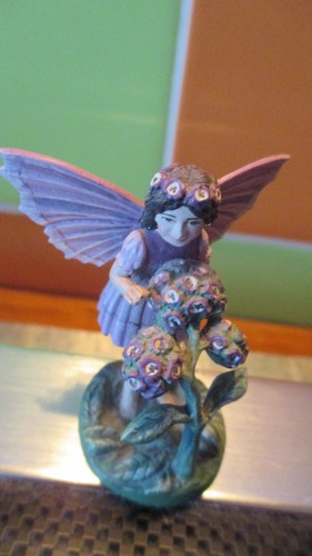 Figurine métal flower - en,