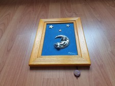 Petit cadre sur velours bleu *