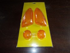 Jeu de 4 cabochons oranges NITRO ( cyclos , scooters , motos )