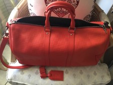 lous Vuitton keepall cuir orange neuf