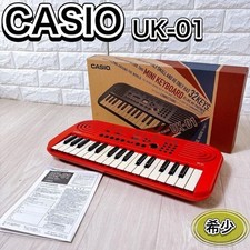 Mini clavier CASIO UK-01 32 touches rouge piano électronique rare...