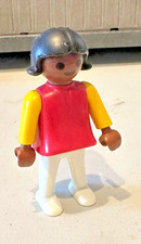 Playmobil - Figurine Enfant Fille Robe Rouge & Jaune