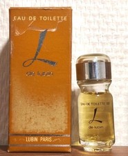 Eau de Toilette L de Lubin 7,5 ml. Sérigraphie. Boite fatiguée. Plein