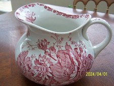 Broc ancien en faïence de