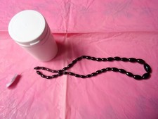 39 perles noires ovales +54