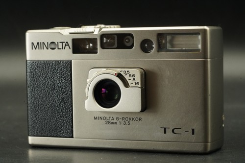 Minolta 35mm point - 35mm, &