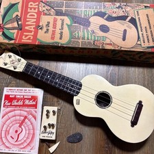 Ancien ukulélé plastique