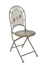 Une chaise en fer - patinée