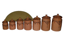 Serie de sept pots à épices