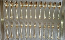 CHRISTOFLE modèle SPATOURS : 12 couverts de ménagère en métal argenté