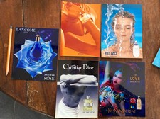 Lot 4 publicités sur papier photo eau sauvage 24 faubourg parfums annees 90