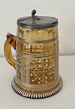 Chope à bière émaillée .