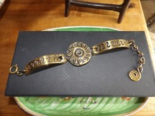 bracelet en bronze doré de M