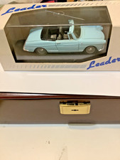 Peugeot 404 cabriolet .  " Boîte Leader par Eligor S.A "