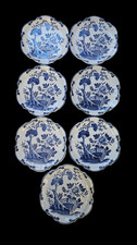 7 Assiettes plates en faïence