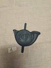 Insigne Peint en bleu 