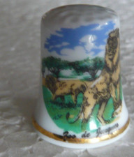 Dé à coudre de collection en porcelaine décoré de lions du zoo de Jurques