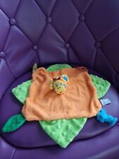 Doudou plat singe orange vert jaune anneau Babymoov 