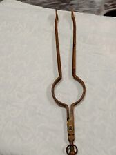Ancienne pince porte-lampe /