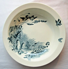 Plat rond creux signé Jules