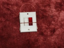 Un Va et Vient à voyant rouge