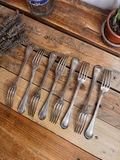Lot 8 fourchettes en argent -