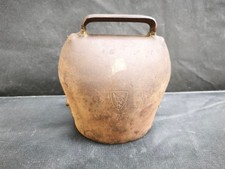 Enorme cloche ancienne vache