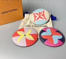 Lot de 3 toupies Louis Vuitton