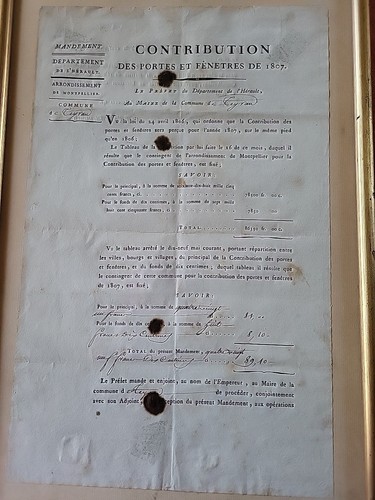 Document ancien encadré daté