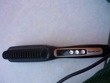 Peigne lisseur électrique Silver Crest très peu servi 