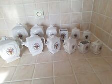 Lot de 12 pots de cheminée anciens en faïence