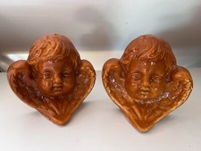 Deux très beaux anges en terre cuite vernissés En parfait état Format 20x18 cm