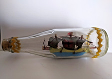 Bateau 3 mats en bouteille