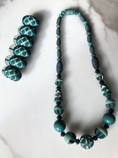 Rare collier et bracelet art