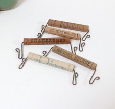 5 Poignées publicitaires bois