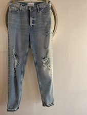 jean mom a trous Calvin Klein