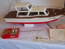 Ancien bateau radiocommandé 1970 Exico avec paperasse et émetteur 