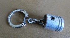 Ancien porte cle métal Super Vitex Piston Chemise Segment Moteur Automobile.