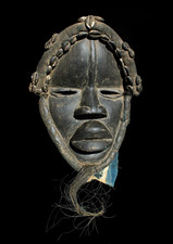 Masque Dan avec tissu pagne et cauris - Libéria - Art africain