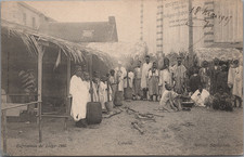 Zoo humain, exposition de Liège, le village sénégalais, cuisine, 1905  Carte pos