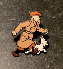 PIN'S TINTIN - HERGE   CORNER N° 273 DU TLL ""TINTIN ET MILOU MARCHANT"