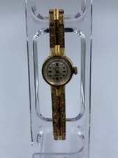 MONTRE FEMME PLAQUE OR RONDE